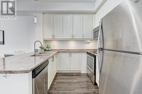 111 - 35 Southshore Crescent, Hamilton, ON - Indoor Photo Showing Kitchen With Double Sink With Upgraded Kitchen