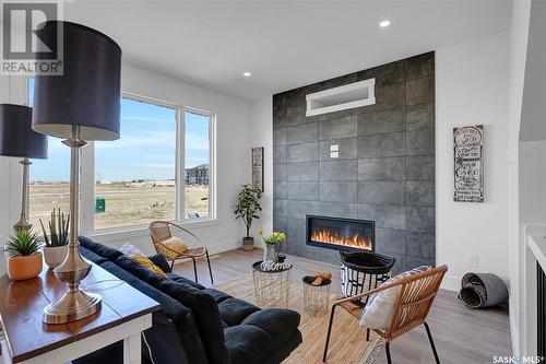 42 Clunie Court, Moose Jaw, SK - Indoor Photo Showing Living Room With Fireplace