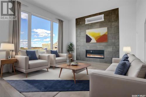 42 Clunie Court, Moose Jaw, SK - Indoor Photo Showing Living Room With Fireplace