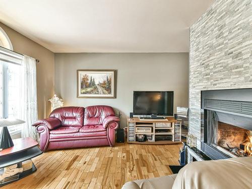 Living room - 50 Rue Achille, Saint-Sauveur, QC - Indoor Photo Showing Living Room With Fireplace