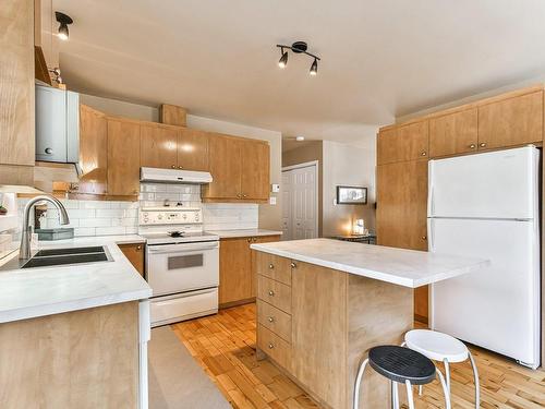 Cuisine - 50 Rue Achille, Saint-Sauveur, QC - Indoor Photo Showing Kitchen With Double Sink