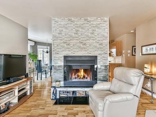 Living room - 50 Rue Achille, Saint-Sauveur, QC - Indoor Photo Showing Living Room With Fireplace