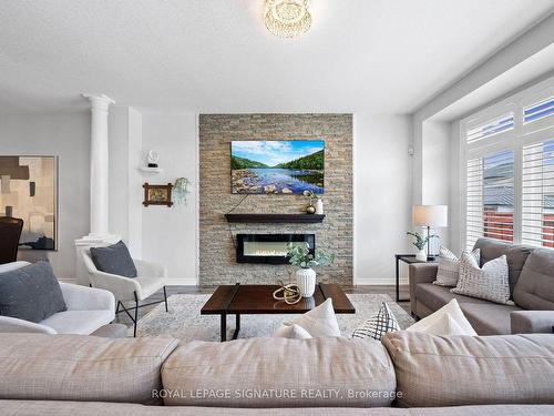 39 Weathering Hts, Hamilton, ON - Indoor Photo Showing Living Room With Fireplace