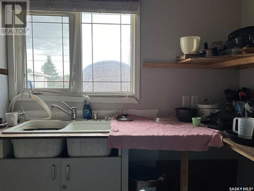 313 3Rd Avenue E, Shellbrook, SK - Indoor Photo Showing Kitchen With Double Sink