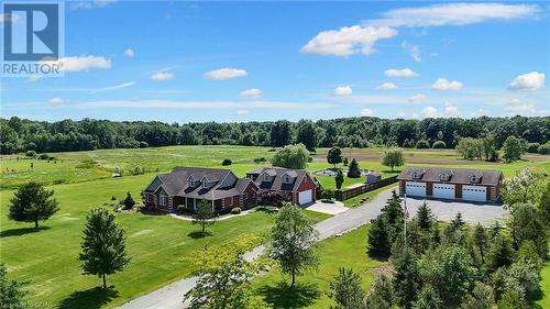 551 Darby Road 60 ft Shop with 4 overhead doors, attached 2 car garage and 12 acres of farm land - 551 Darby Road, Welland, ON 