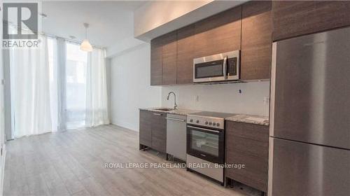 3604 - 28 Wellesley Street E, Toronto, ON - Indoor Photo Showing Kitchen With Stainless Steel Kitchen With Upgraded Kitchen