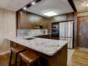 Cuisine - 503-490 Boul. Galland, Dorval, QC  - Indoor Photo Showing Kitchen With Upgraded Kitchen 