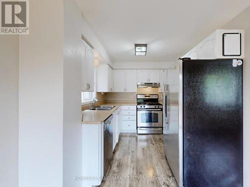 86 Wessenger Drive, Barrie, ON - Indoor Photo Showing Kitchen With Double Sink