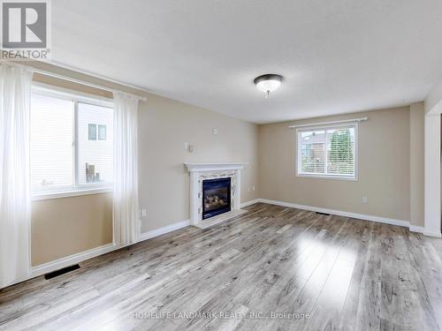 86 Wessenger Drive, Barrie, ON - Indoor Photo Showing Living Room With Fireplace