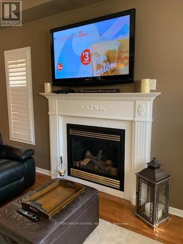 36 Serenity Street, Halton Hills, ON - Indoor Photo Showing Living Room With Fireplace