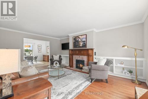 12510 Loyalist Parkway, Prince Edward County (Picton), ON - Indoor Photo Showing Living Room With Fireplace