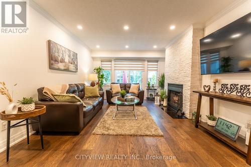 41 - 2199 Burnhamthorpe Road W, Mississauga, ON - Indoor Photo Showing Living Room With Fireplace