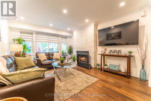 41 - 2199 Burnhamthorpe Road W, Mississauga, ON - Indoor Photo Showing Living Room With Fireplace