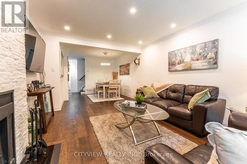 41 - 2199 Burnhamthorpe Road W, Mississauga, ON - Indoor Photo Showing Living Room With Fireplace