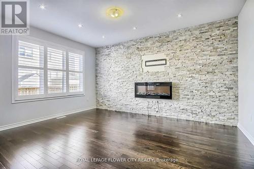 609 Gibson Crescent, Milton, ON - Indoor Photo Showing Living Room With Fireplace