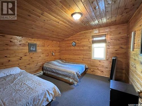 Acreage Bordering Meadow Lake Provincial Park, Dorintosh, SK - Indoor Photo Showing Bedroom