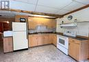 Acreage Bordering Meadow Lake Provincial Park, Dorintosh, SK  - Indoor Photo Showing Kitchen With Double Sink 