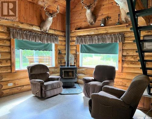 Acreage Bordering Meadow Lake Provincial Park, Dorintosh, SK - Indoor Photo Showing Other Room With Fireplace