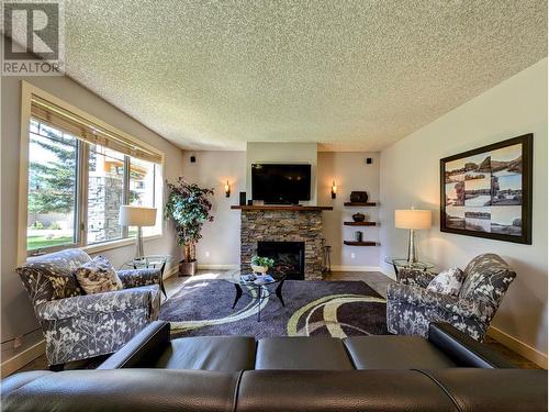 500 Bighorn Boulevard Unit# 512B, Radium Hot Springs, BC - Indoor Photo Showing Living Room With Fireplace