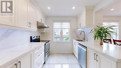 4 - 79 Rameau Drive, Toronto, ON - Indoor Photo Showing Kitchen With Double Sink With Upgraded Kitchen