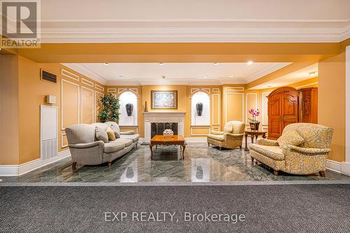 521 - 32 Clarissa Drive, Richmond Hill, ON - Indoor Photo Showing Living Room With Fireplace