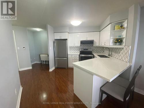 2211 - 3880 Duke Of York Boulevard, Mississauga, ON - Indoor Photo Showing Kitchen With Double Sink