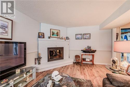 57 Inverness Drive, Cambridge, ON - Indoor Photo Showing Living Room With Fireplace