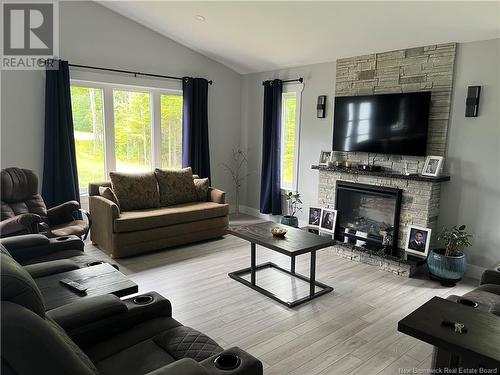 1926 Route 365, Petit-Tracadie, NB - Indoor Photo Showing Living Room With Fireplace