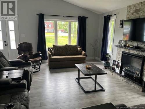 1926 Route 365, Petit-Tracadie, NB - Indoor Photo Showing Living Room With Fireplace