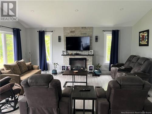 1926 Route 365, Petit-Tracadie, NB - Indoor Photo Showing Living Room With Fireplace