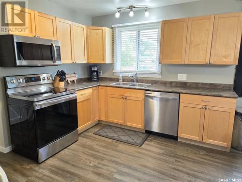 216 Cross Street, Outlook, SK - Indoor Photo Showing Kitchen With Double Sink