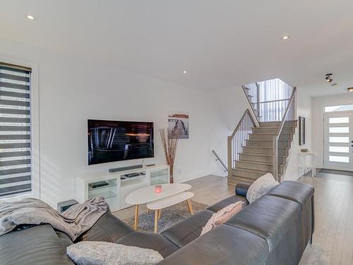 Salon - 101 Rue Georges-Estu, Lavaltrie, QC - Indoor Photo Showing Living Room