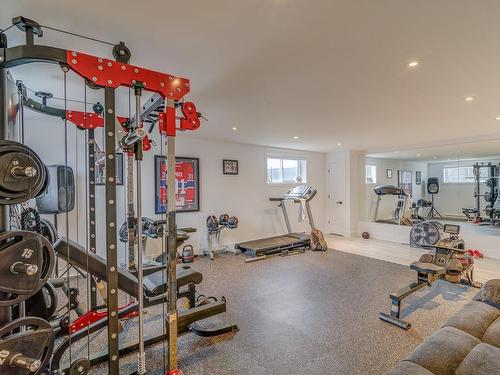 Family room - 101 Rue Georges-Estu, Lavaltrie, QC - Indoor Photo Showing Gym Room