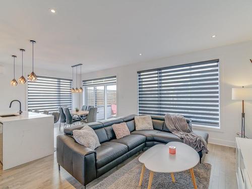 Salon - 101 Rue Georges-Estu, Lavaltrie, QC - Indoor Photo Showing Living Room