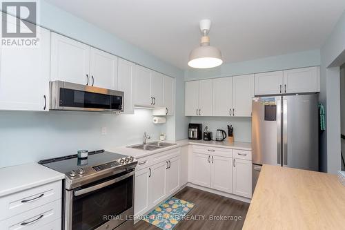 100 - 700 Osgoode Drive, London, ON - Indoor Photo Showing Kitchen With Double Sink