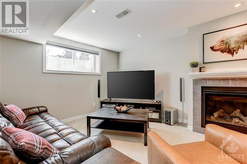 377 Memorial Grove, Ottawa, ON - Indoor Photo Showing Living Room With Fireplace