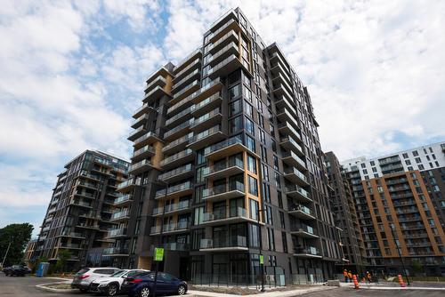 Exterior - 805-3480 Boul. St-Elzear O., Laval (Chomedey), QC - Outdoor With Balcony With Facade