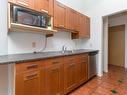 408-1619 Morrison St, Victoria, BC  - Indoor Photo Showing Kitchen With Double Sink 