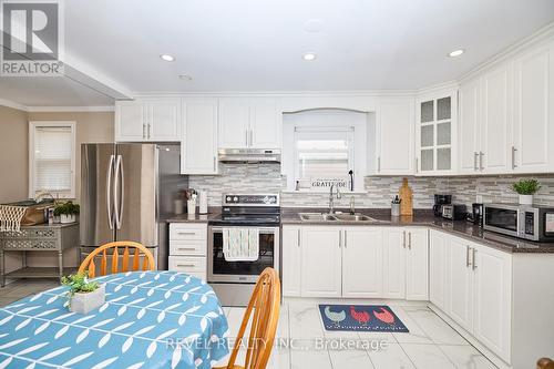 5267 Mcrae Street, Niagara Falls, ON - Indoor Photo Showing Kitchen With Double Sink