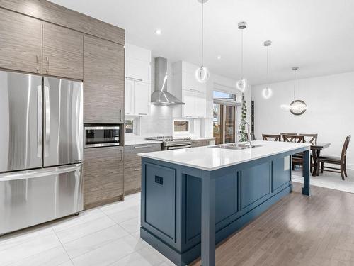 Kitchen - 7 Rue Mercier, Dollard-Des-Ormeaux, QC - Indoor Photo Showing Kitchen With Upgraded Kitchen