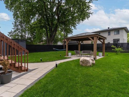 Backyard - 7 Rue Mercier, Dollard-Des-Ormeaux, QC - Outdoor With Backyard