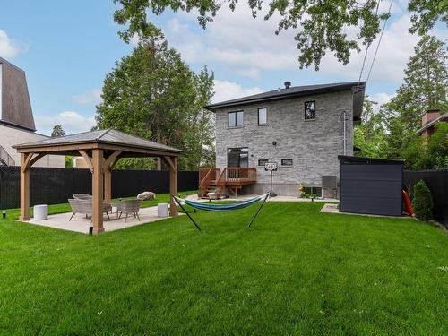 Backyard - 7 Rue Mercier, Dollard-Des-Ormeaux, QC - Outdoor With Backyard