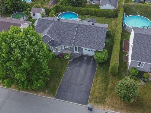 Frontage - 641 162E Rue, Saint-Georges, QC - Outdoor With Above Ground Pool