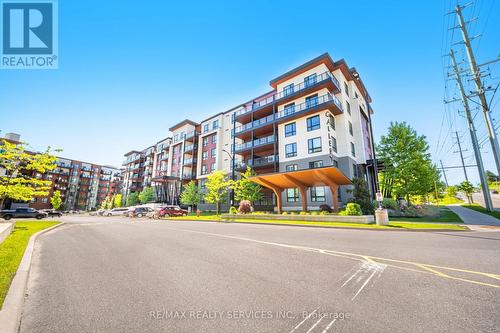 105 - 306 Essa Road, Barrie, ON - Outdoor With Balcony With Facade