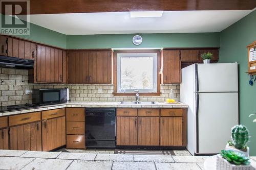 1417 Gill Road, Springwater (Midhurst), ON - Indoor Photo Showing Kitchen With Double Sink