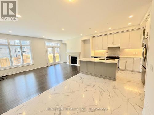 2459 Saw Whet Boulevard, Oakville (Glen Abbey), ON - Indoor Photo Showing Kitchen With Fireplace