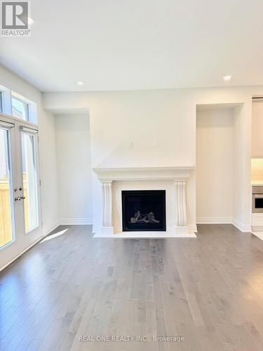 2459 Saw Whet Boulevard, Oakville (Glen Abbey), ON - Indoor Photo Showing Living Room With Fireplace