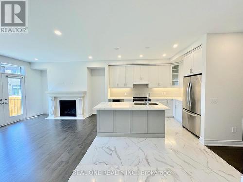 2459 Saw Whet Boulevard, Oakville (Glen Abbey), ON - Indoor Photo Showing Kitchen With Fireplace