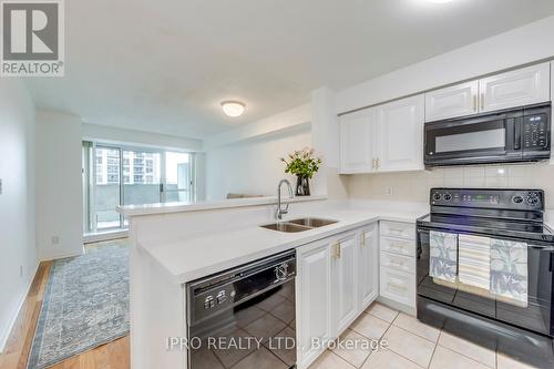 506 - 7 Michael Power Place, Toronto (Islington-City Centre West), ON - Indoor Photo Showing Kitchen With Double Sink