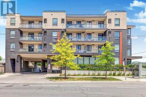 111 - 3560 St. Clair Avenue E, Toronto, ON - Outdoor With Balcony With Facade